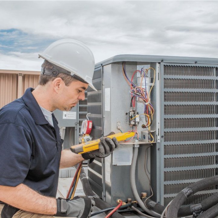 Lucan Heating & Cooling HVAC technician on a service call in Lucan, Ontario